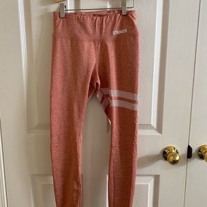 STRONGER leggings in pink size small.